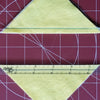 Double checking 1/4" seam with a Quarter Inch Patchwork Ruler "QIP"