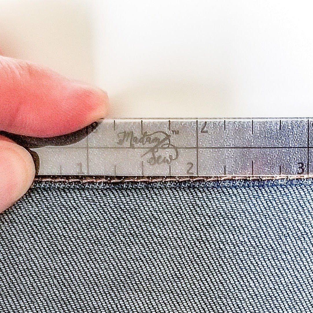 Double checking a 1/2" seam with a Quarter Inch Patchwork Ruler "QOP"