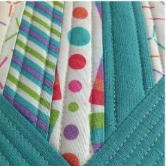 Picture showing straight sewn lines that were made using the Quarter Inch Quilting Foot with Guide.