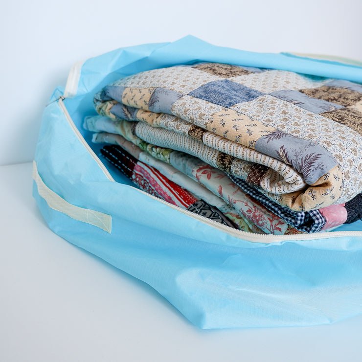Quilts in a quilt storage bag