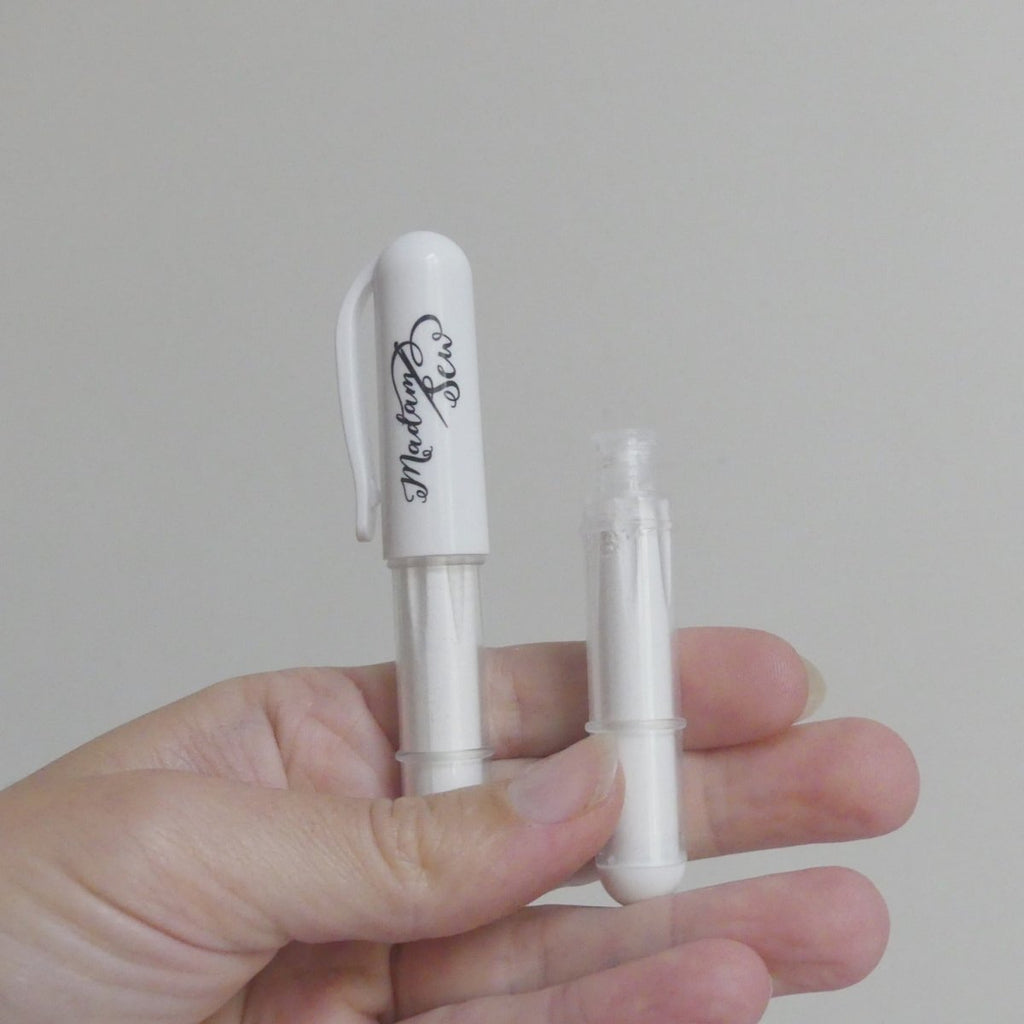 white chalk marker from MadamSew.com and a chalk marker refill in white