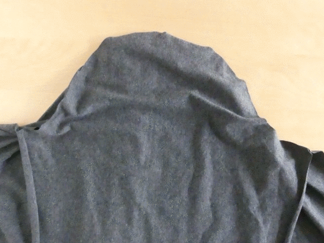 Gif of sewing clips being used on the sleeve of a sewing project