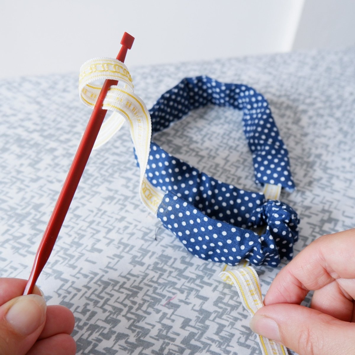 Using Sewist's Magic Wand as a bodkin to feed elastic through a sewing project