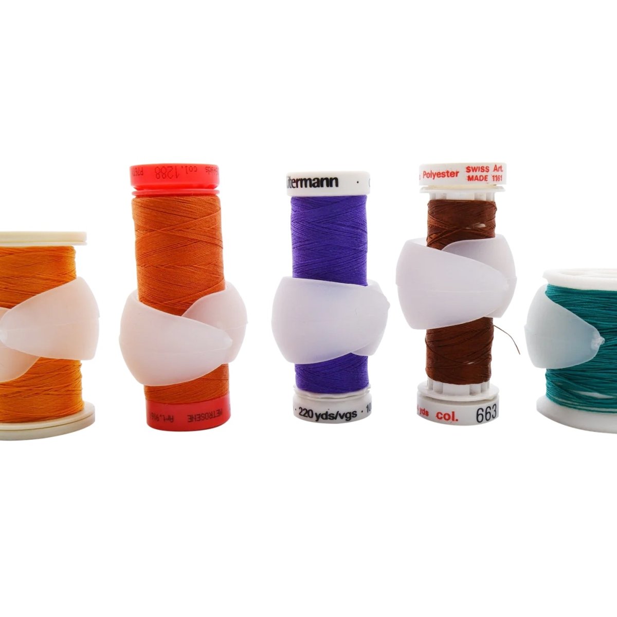 spool huggers around different types of sewing spools and cones