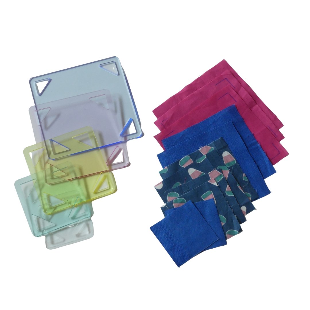 Fabric squares that had been cut using the colorful 5pc Square Template Set