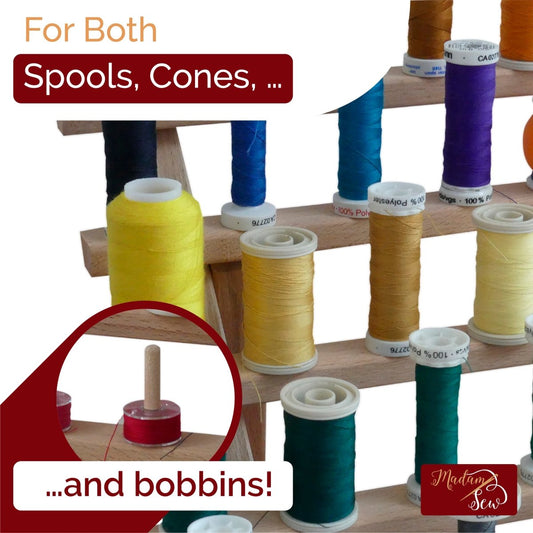 detail of a thread rack of a bobbin on a thread rack pin