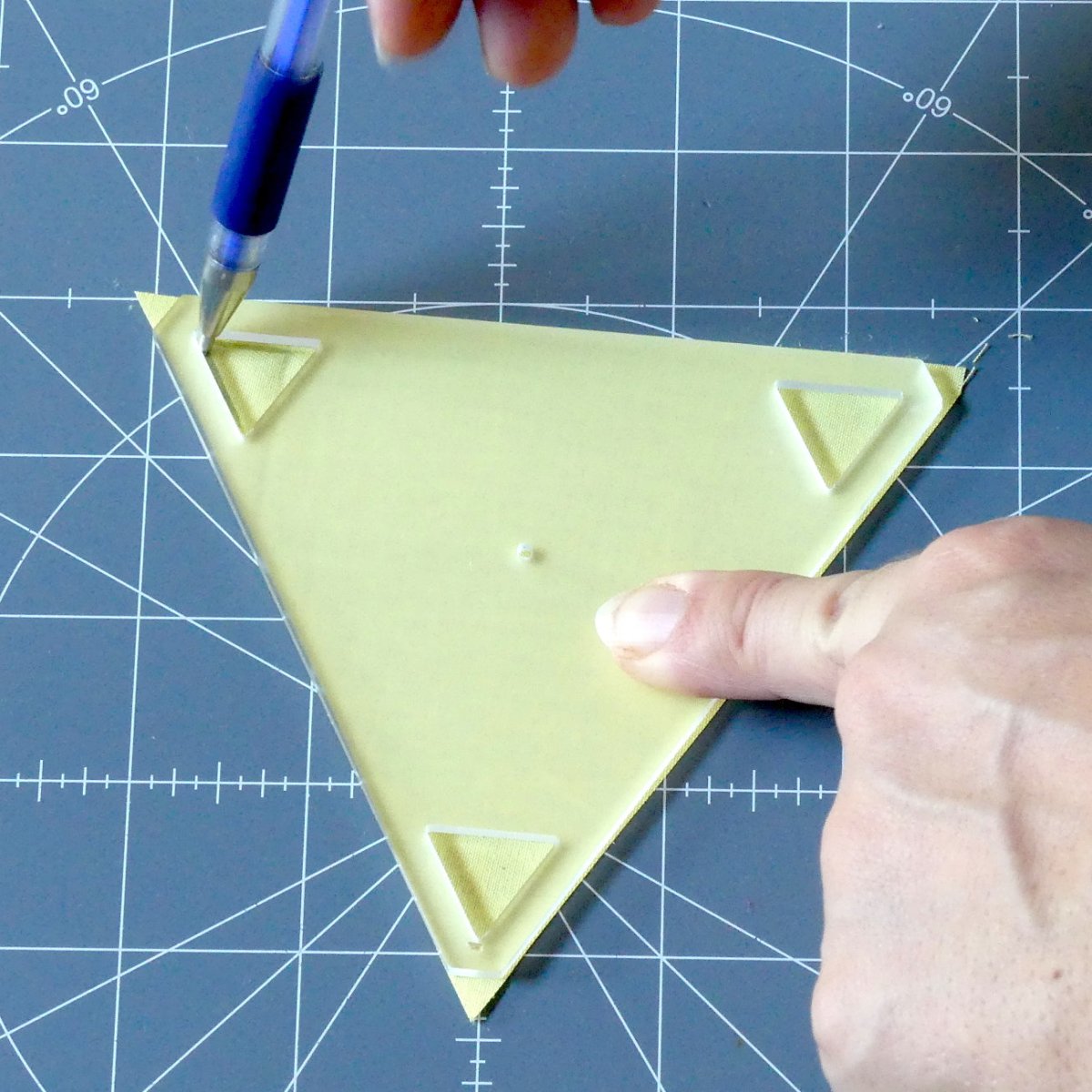 Marking in the little triangle of a 60 degree Triangle Template