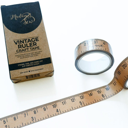 two vintage style craft tape rolls with the box