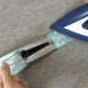 Ironing bias tape as it comes out of the Extra Large (XL) Bias Tape Maker